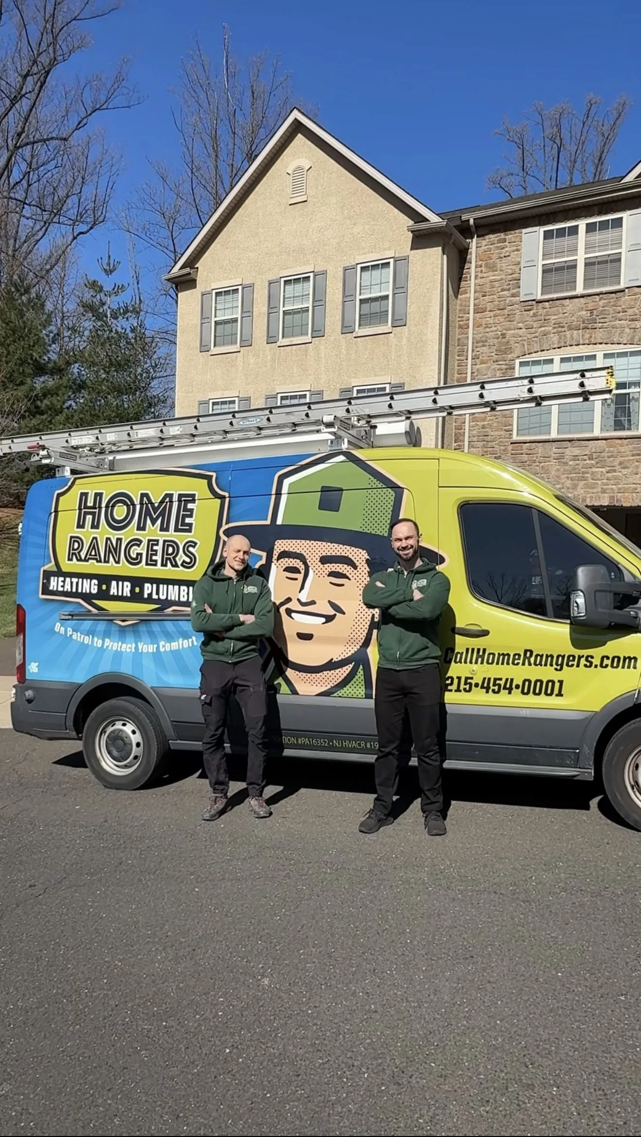 Home rangers hvac and plumbing team standing by a service van in bucks county