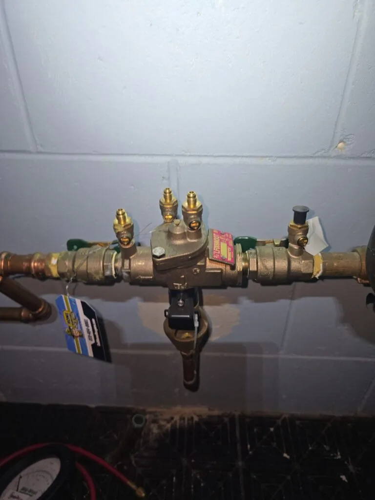 Home rangers installed backflow prevention device with service tag in bucks county pa