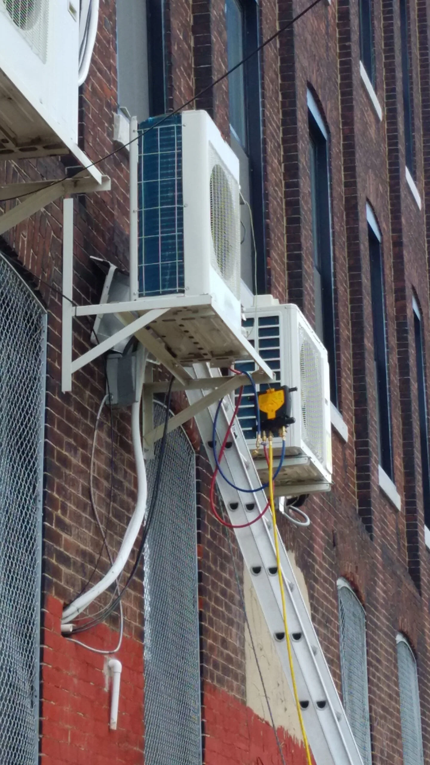 Wall mounted mini split systems with indoor and outdoor units