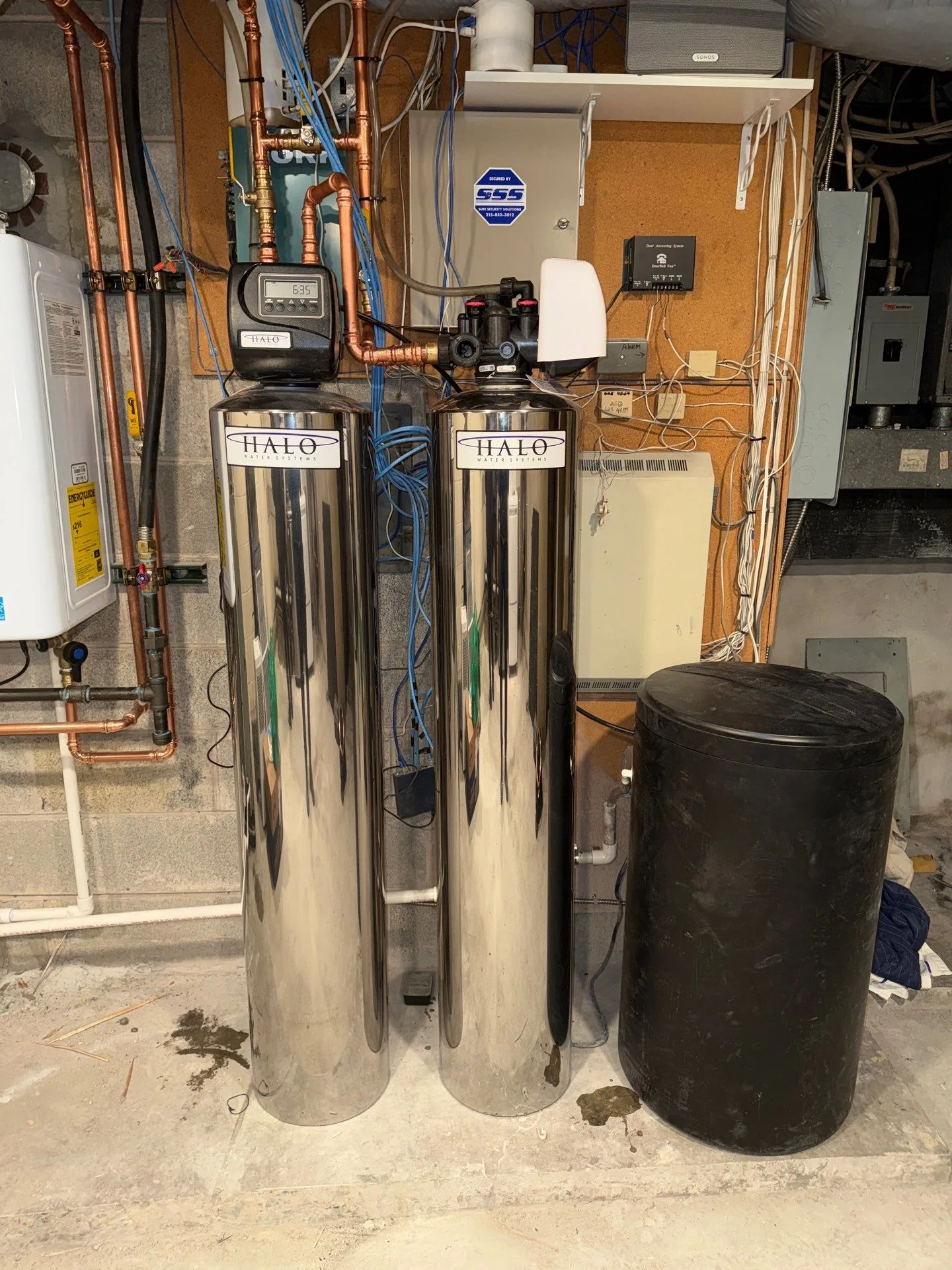 Dual water filter plumbing installation in a home