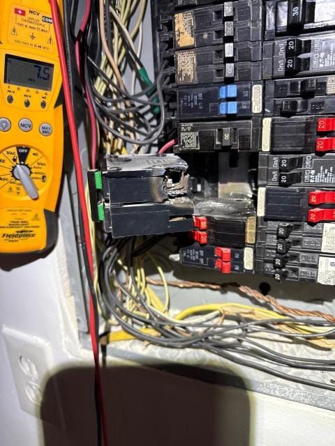 Diagnosed an heat pump cooling issue and traced it to a melted main breaker in the electrical panel. Advised the homeowner to call an electrician for repairs.