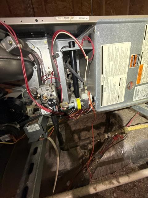 Performed a detailed heating system inspection for a homeowner. The home has two carrier gas furnaces—one in the basement and another in the attic—both showing signs of air leakage at the coil and plenum connections. We noted a dirty blower motor with oil residue, loose drain lines, and a broken humidistat. Explained our 21-point tune-up to ensure both systems run safely and efficiently before the cold weather sets in.
