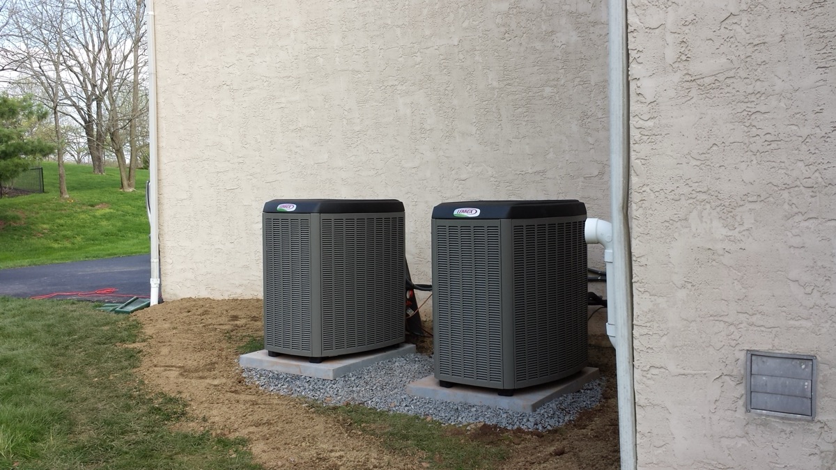 Home rangers hvac zoning systems photo showing dual lennox outdoor units for a zoned home comfort system