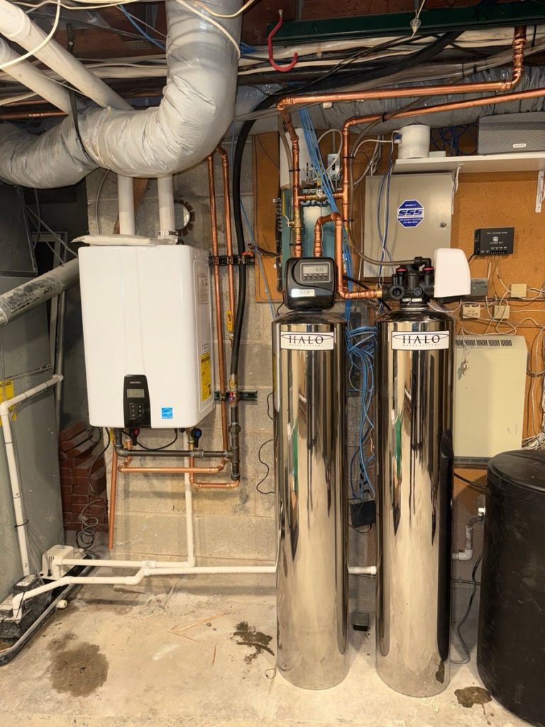 Home rangers water filtration system installation with halo water treatment tanks and tankless water heater