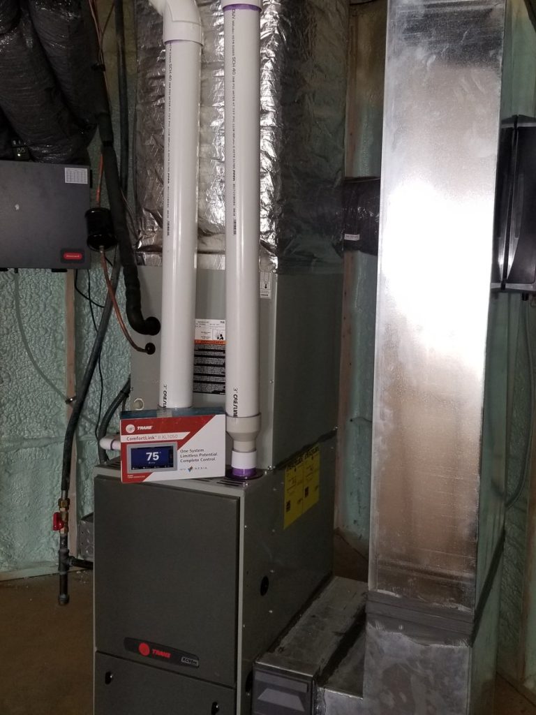 Home rangers smart thermostat installation photo showing a trane comfortlink thermostat and hvac system setup