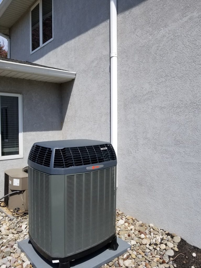 Home rangers air conditioning installation photo showing a trane xl16 outdoor condenser on a clean pad