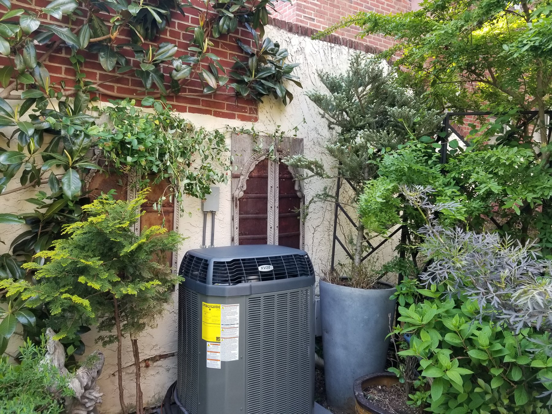 Installed air conditioner near a home