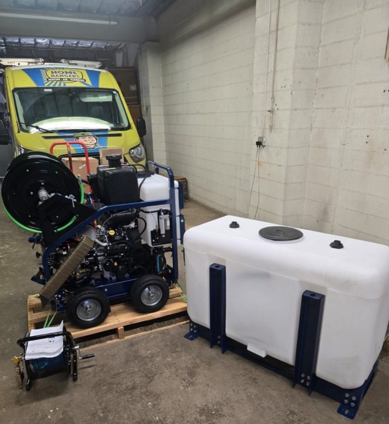 Home rangers hydro jetting equipment staged with service van for drain cleaning work